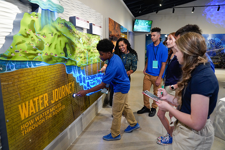 _JER1197-web picture of students interacting with the water journey diagram